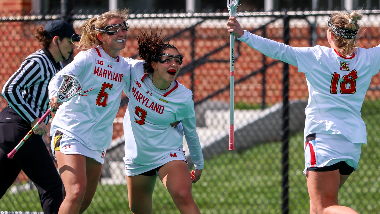 Maryland's Libby May celebrates a goal with teammates.