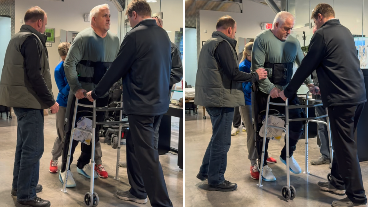 Paul Gait moves with the assistance of a robotic exoskeleton and a walker