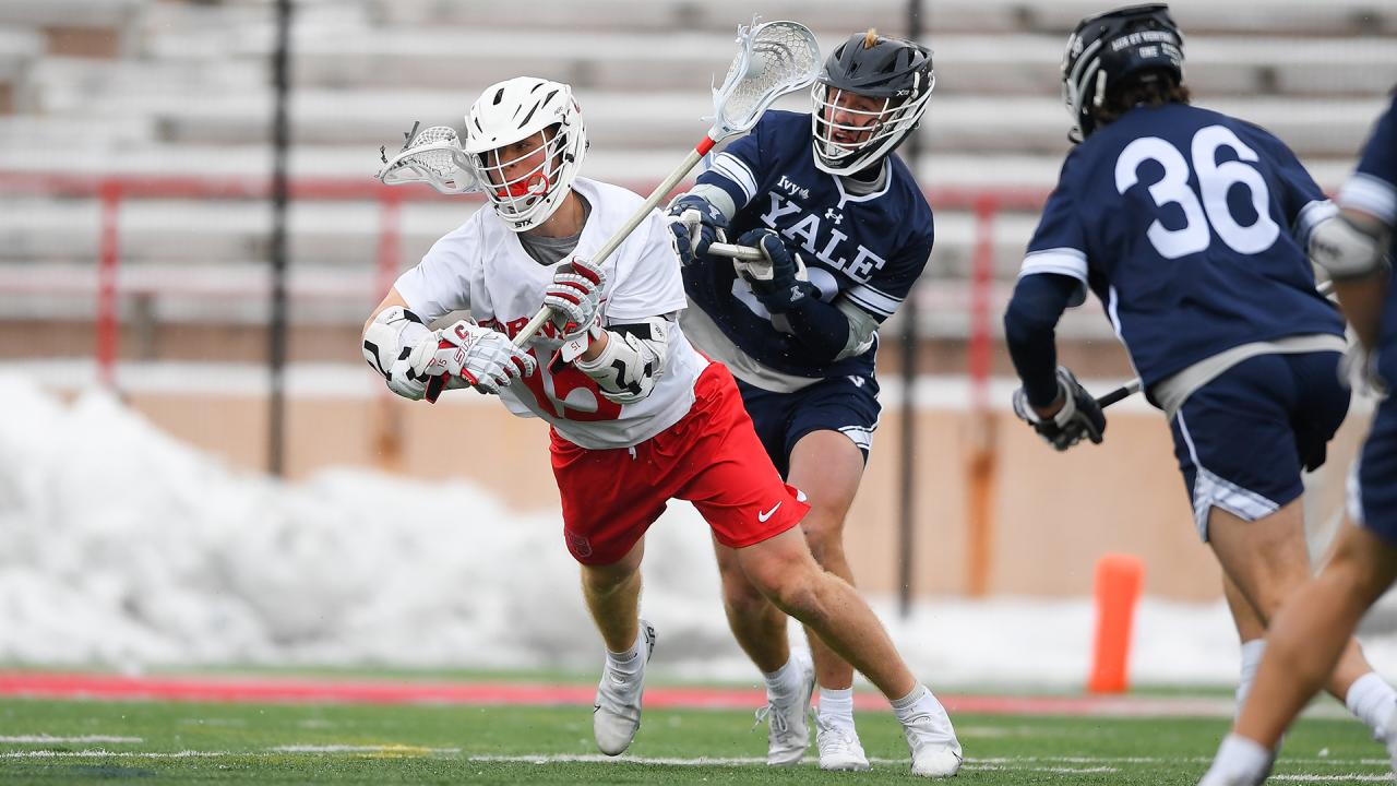 Cornell men's lacrosse player CJ Kirst shooting in a game against Yale